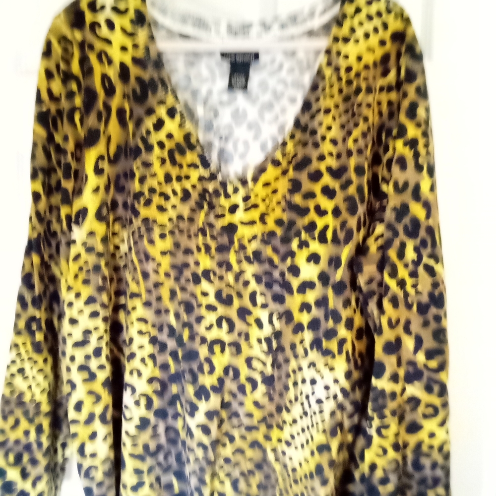Lane Bryant size 26/28 yellow,brown,and black leopard print sweater.